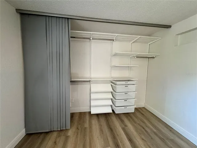 a empty closet with white paint