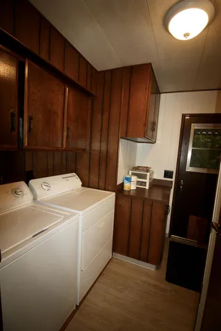 a view of a porch with furniture and yard
