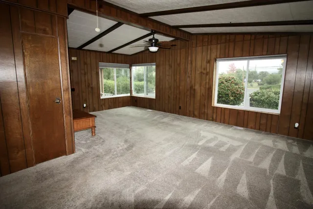 en empty room with windows