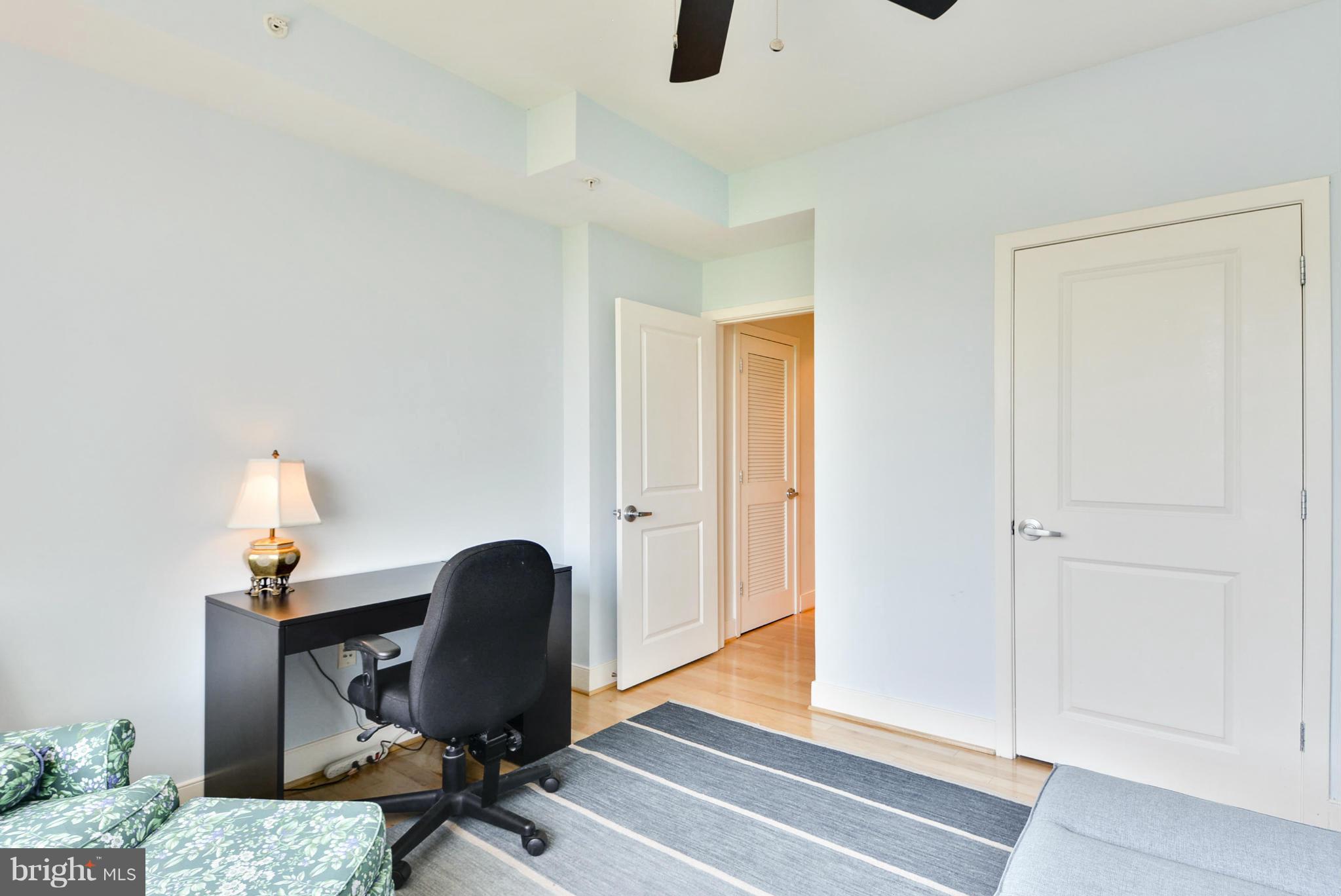 4101 Albemarle Street Northwest, Unit 337 Washington, DC 20016 - Photo 17 of 30 a view of a workspace with furniture and a window