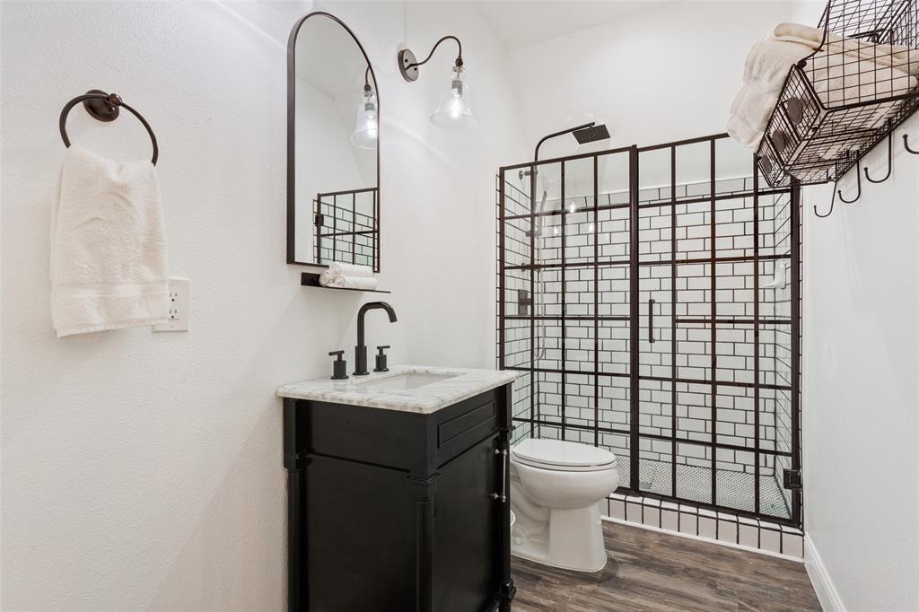 566 Benevolence Way China Spring, TX 76633 - Photo 26 of 35 a bathroom with a sink toilet and shower