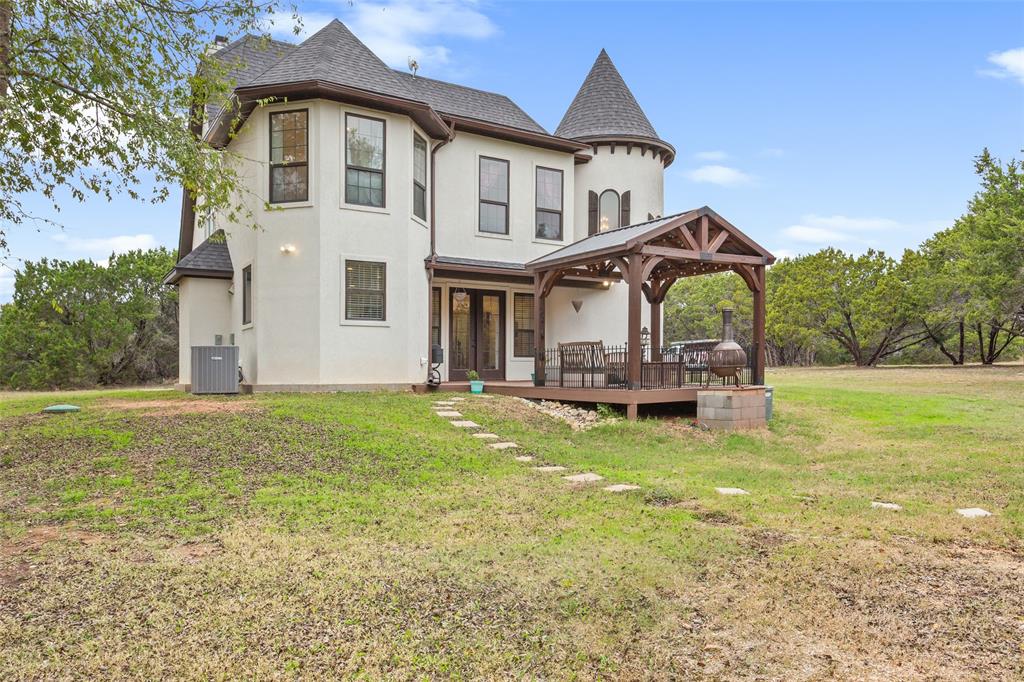 566 Benevolence Way China Spring, TX 76633 - Photo 29 of 35 a front view of a house with garden