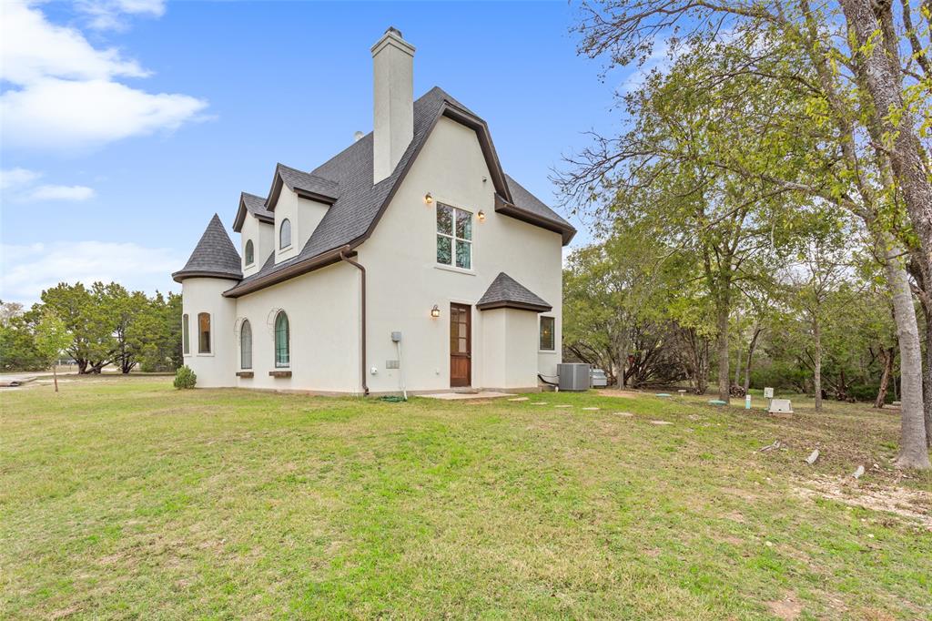 566 Benevolence Way China Spring, TX 76633 - Photo 32 of 35 a view of a house with a yard