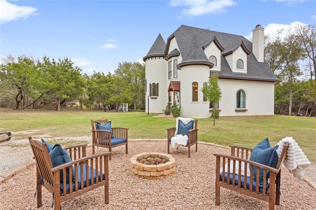 566 Benevolence Way China Spring, TX 76633 - Photo 4 of 35 a balcony with table and chairs