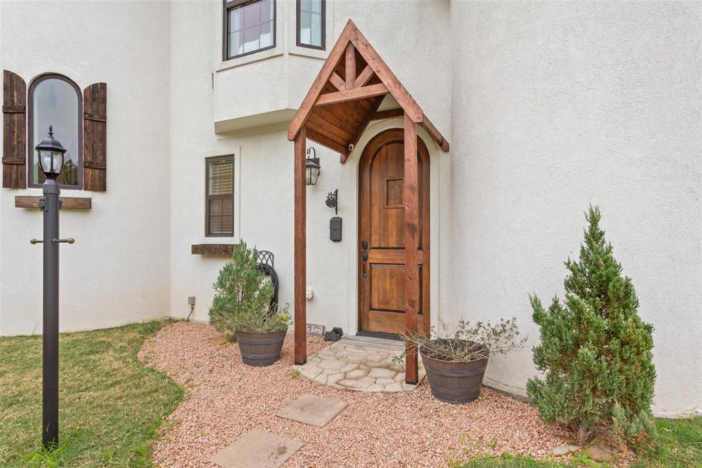 566 Benevolence Way China Spring, TX 76633 - Photo 5 of 35 a front view of a house with garden