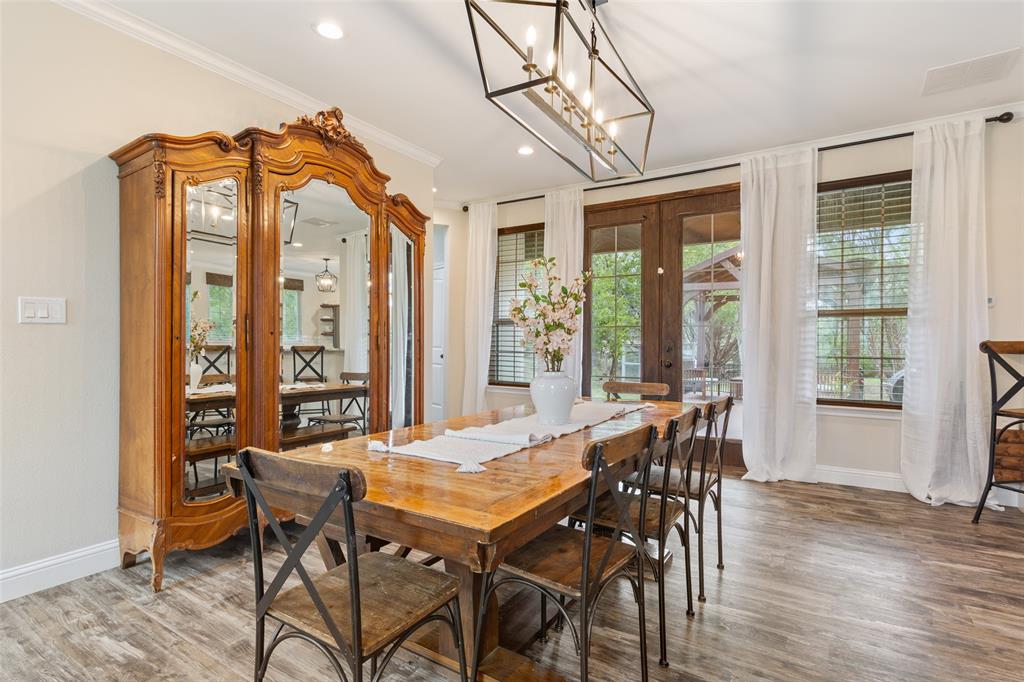 566 Benevolence Way China Spring, TX 76633 - Photo 9 of 35 a view of a dining room with furniture window and wooden floor