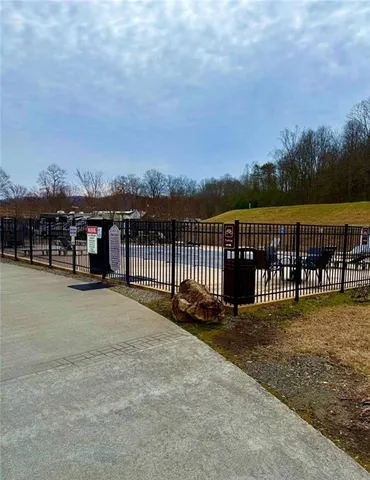 a view of a street from a roof deck
