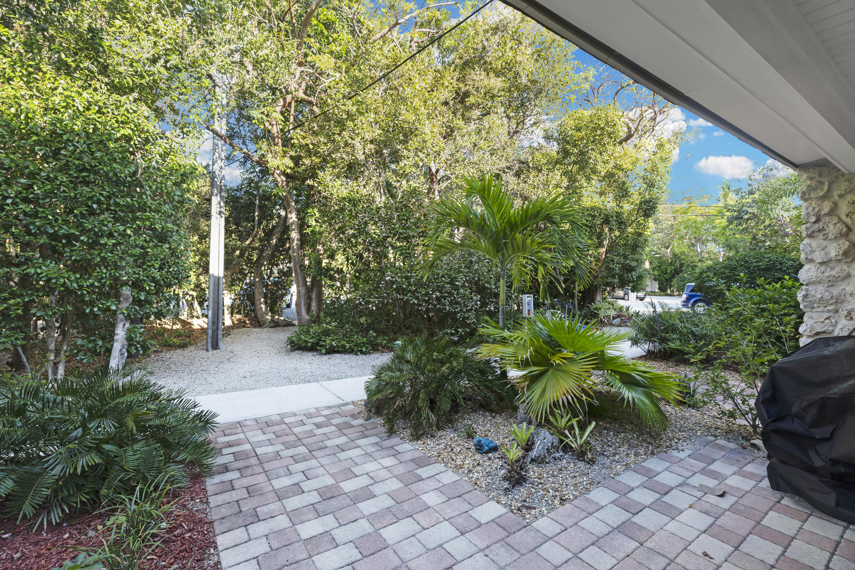 96000 Overseas Highway, Unit E5 Key Largo, FL 33037 - Photo 2 of 47 a plant is in a garden