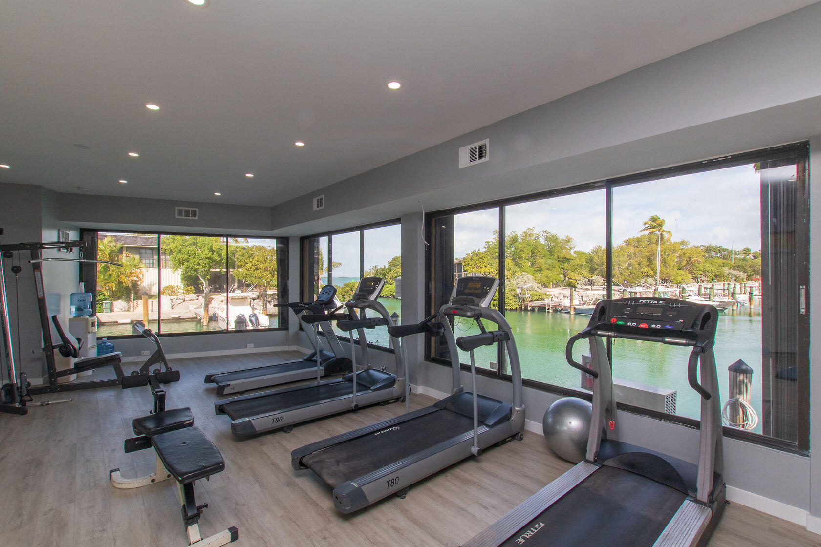 96000 Overseas Highway, Unit E5 Key Largo, FL 33037 - Photo 38 of 47 a living room with furniture and large windows