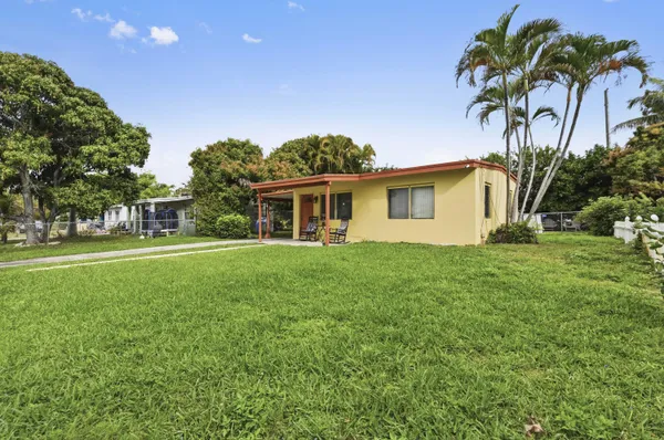 a house view with a garden space