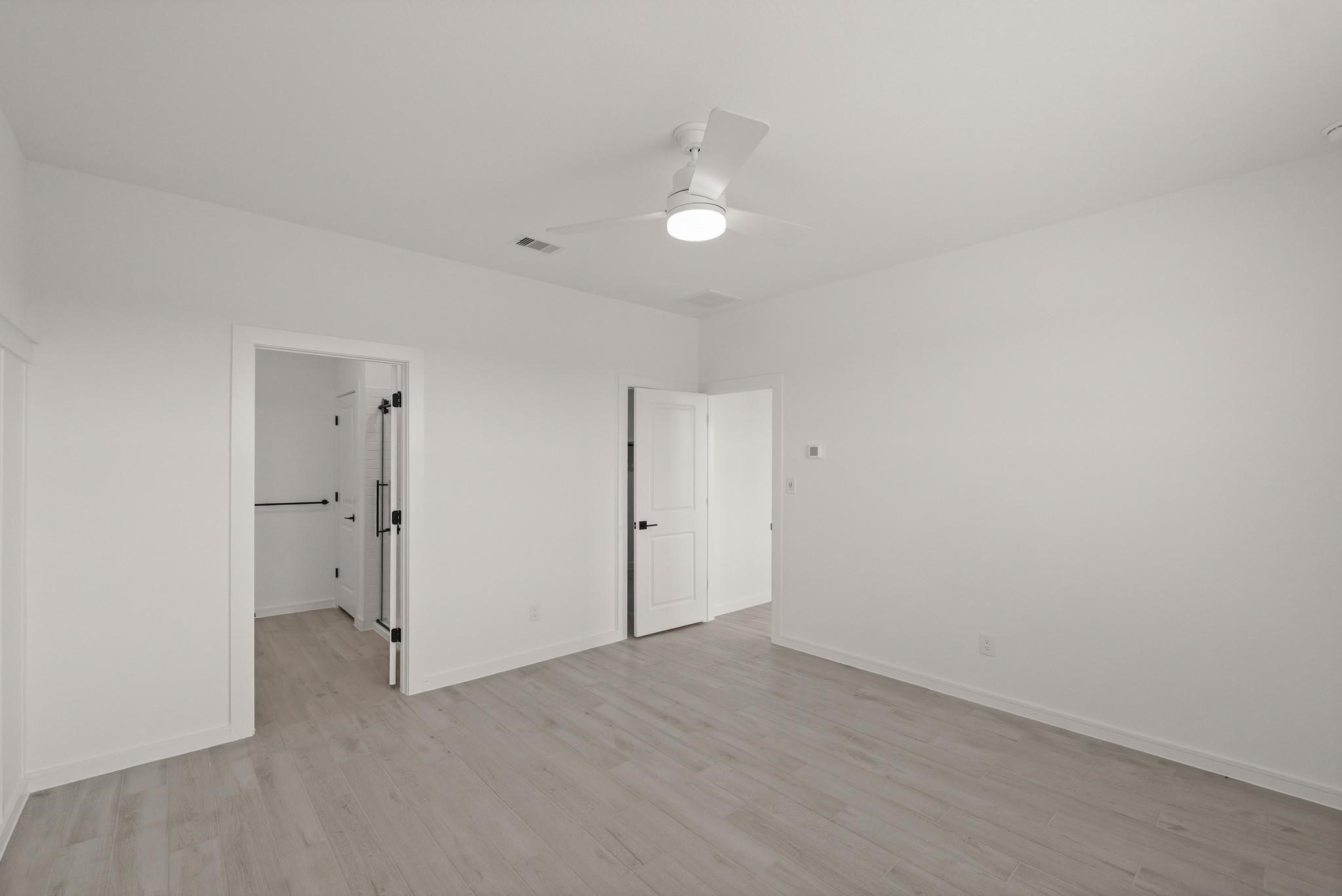 7815 Jade Crest Drive Angleton, TX 77515 - Photo 14 of 31 wooden floor in an empty room