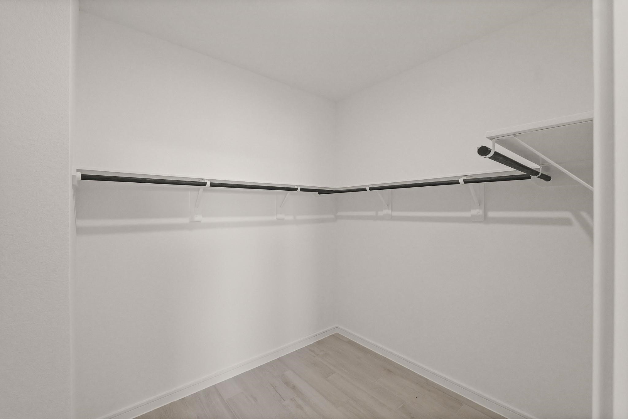 7815 Jade Crest Drive Angleton, TX 77515 - Photo 18 of 31 a view of a room with racks on the wall