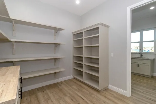 a room with cabinets and a window