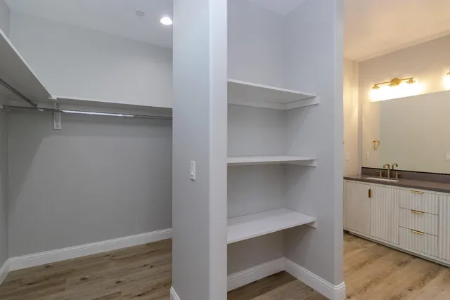 a view of an empty walk in closet
