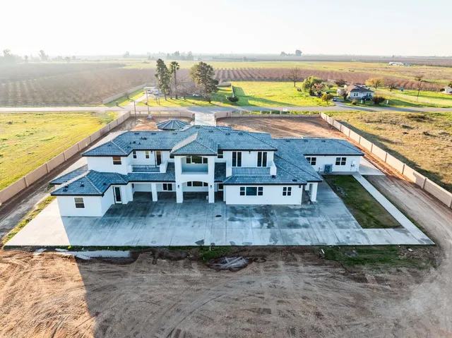 a view of a swimming pool with an ocean view