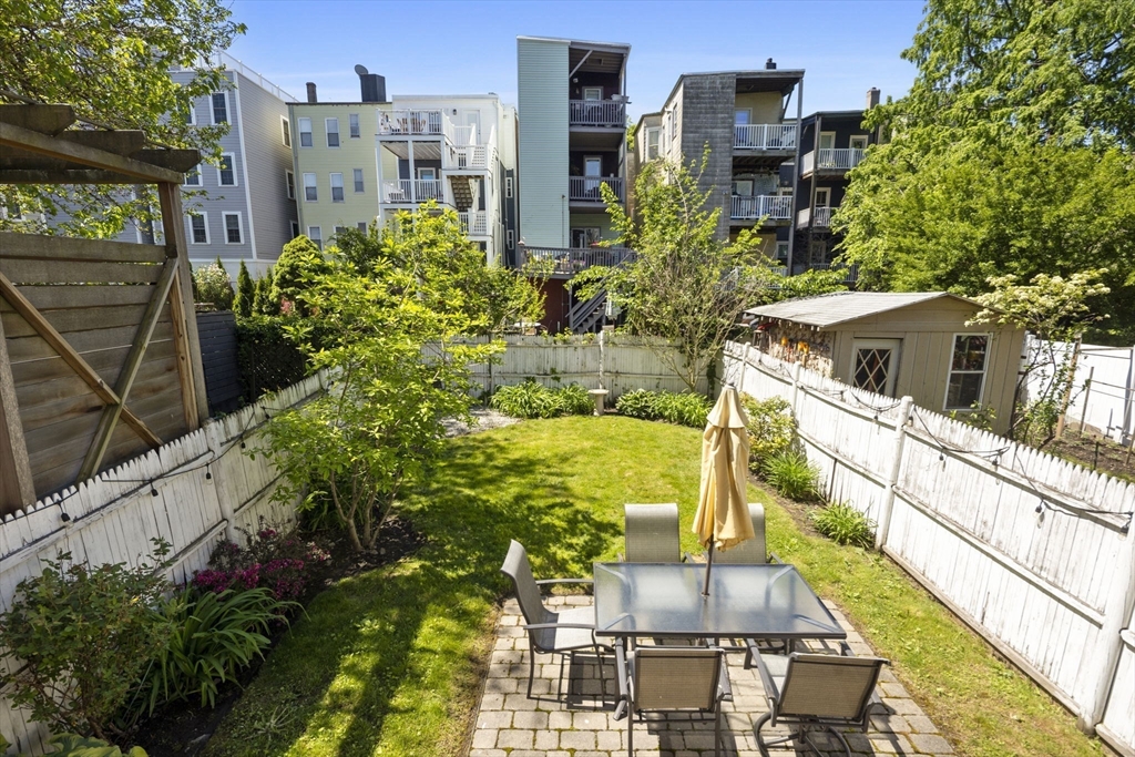 299 Sumner Street, Unit 1 Boston, MA 02128 - Photo 6 of 23 a view of a balcony with chairs