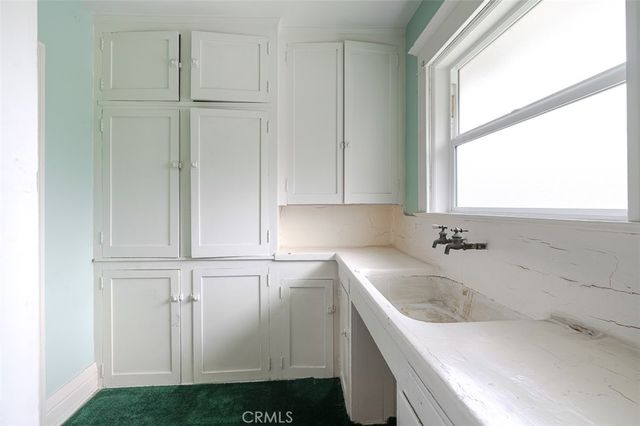 a bathroom with a sink and a bathtub
