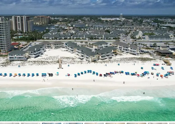 a view of a swimming pool and a yard