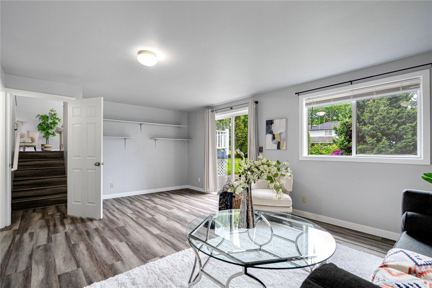 2 199th Place Southeast Bothell, WA 98012 - Photo 12 of 30 a living room with furniture and a floor to ceiling window