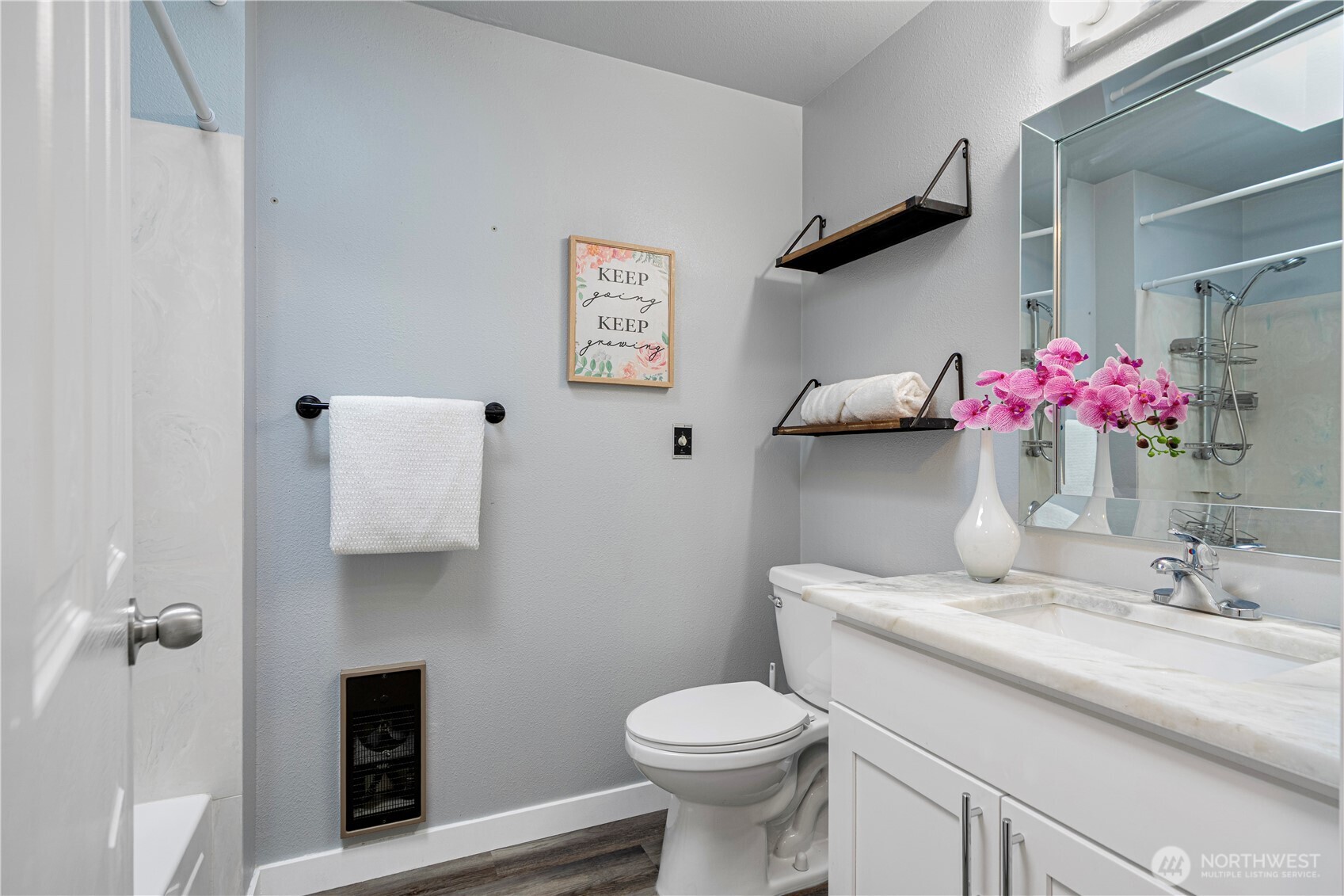 2 199th Place Southeast Bothell, WA 98012 - Photo 13 of 30 a bathroom with a sink vanity mirror and toilet