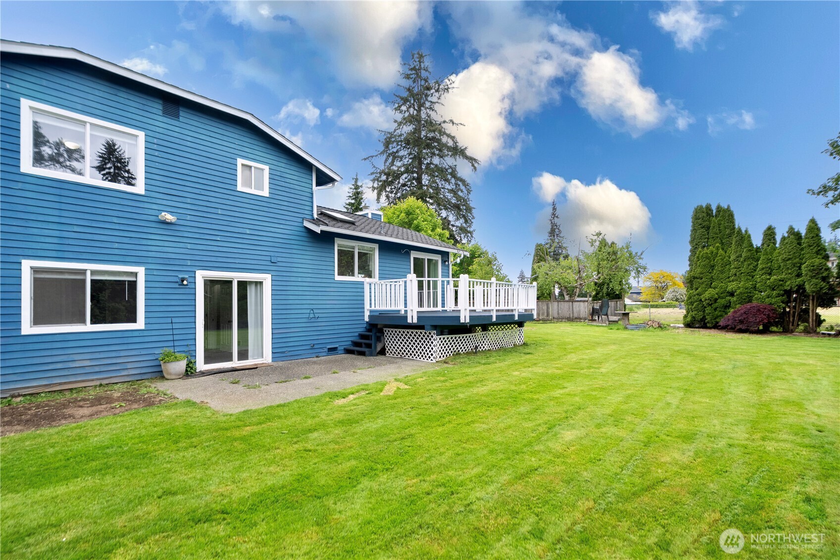 2 199th Place Southeast Bothell, WA 98012 - Photo 23 of 30 a view of a house with a yard and sitting area