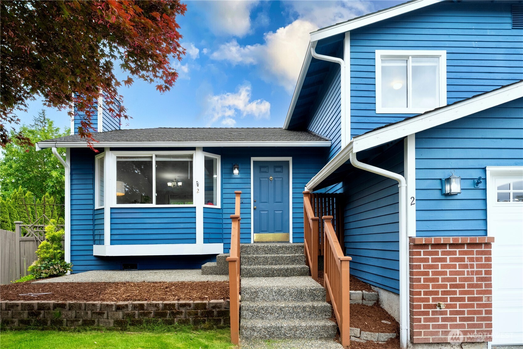 2 199th Place Southeast Bothell, WA 98012 - Photo 24 of 30 a front view of a house with a yard