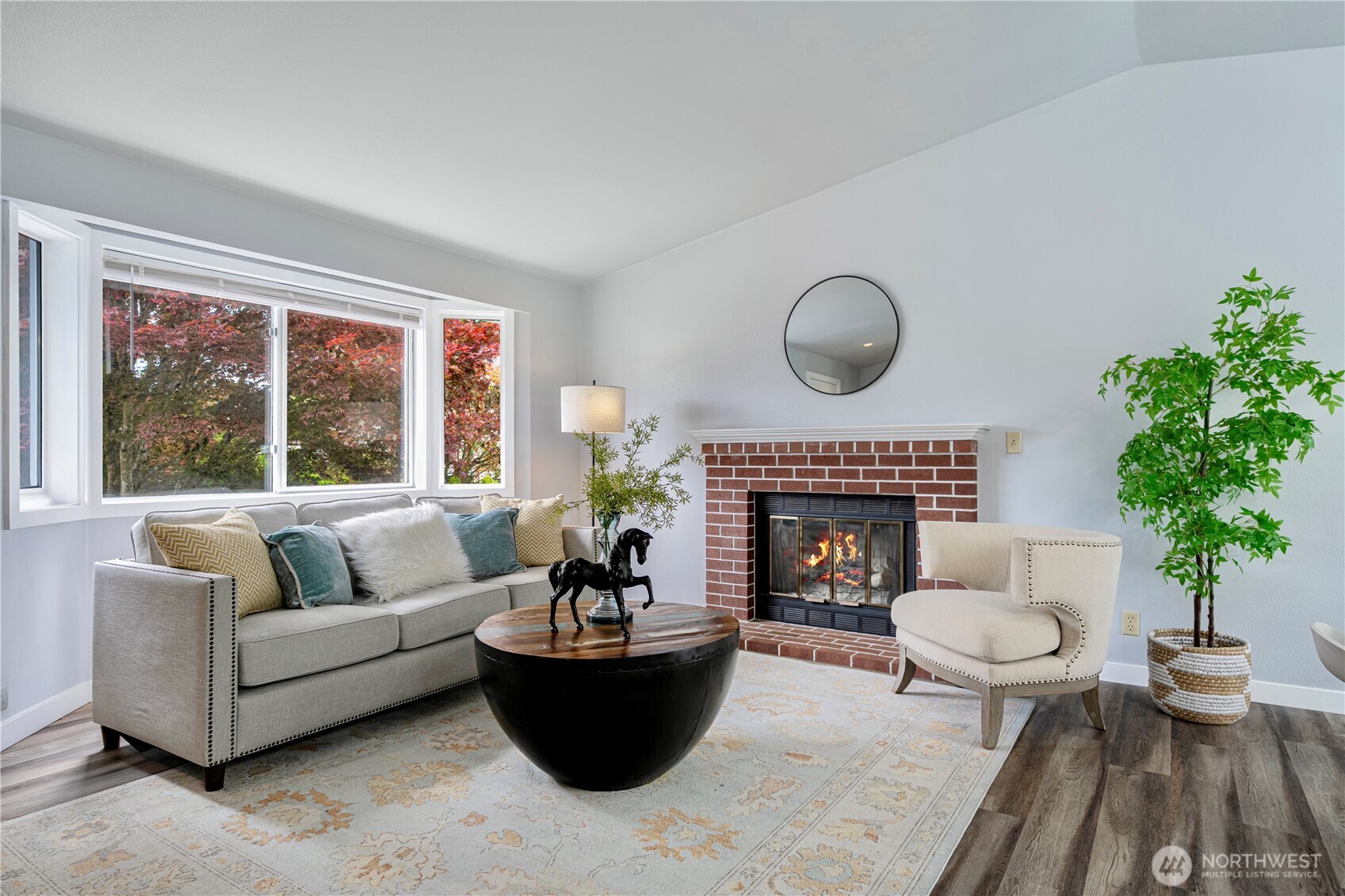 2 199th Place Southeast Bothell, WA 98012 - Photo 3 of 30 a living room with furniture and a fireplace
