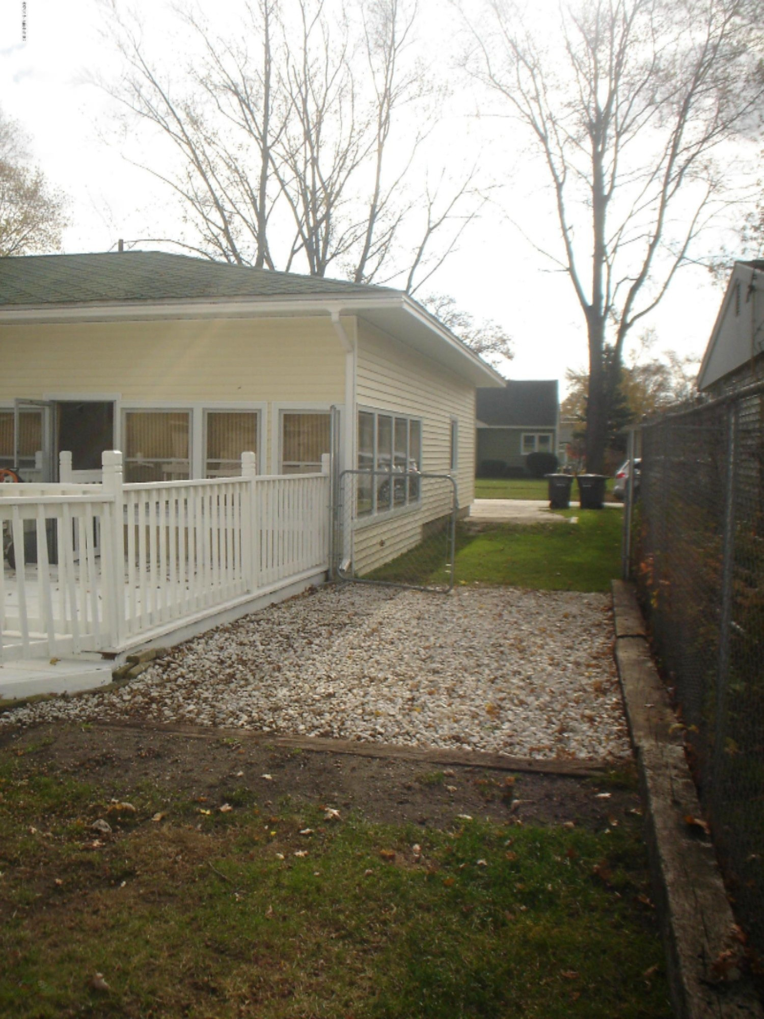 1456 Princeton Road Muskegon, MI 49441 - Photo 32 of 33 Side Exterior /Poured Concrete Pad