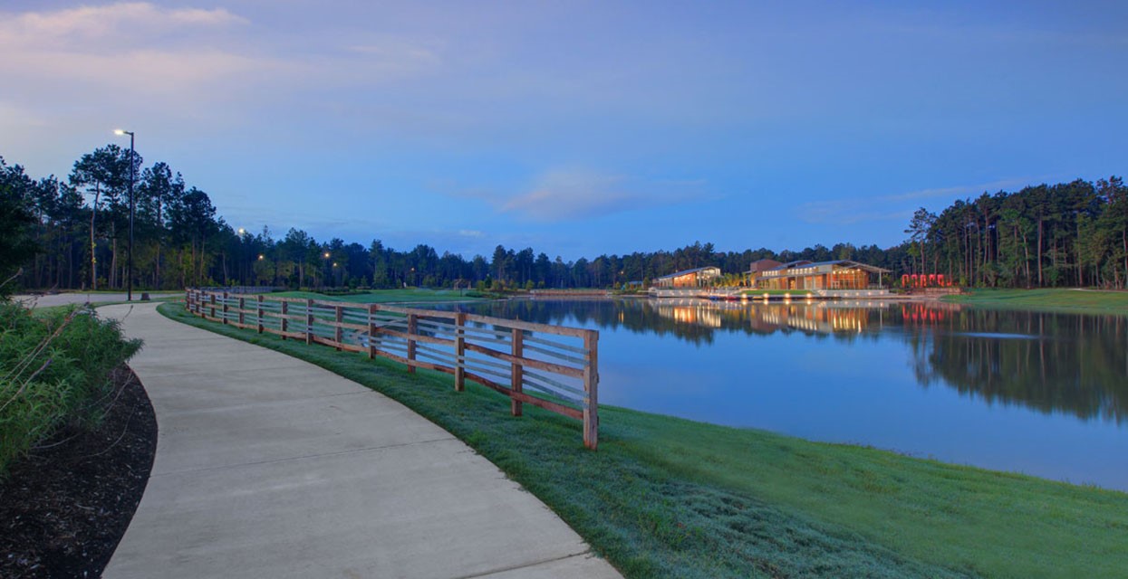 14952 Bright Berry Drive Conroe, TX 77302 - Photo 18 of 19 a view of a lake with a big yard