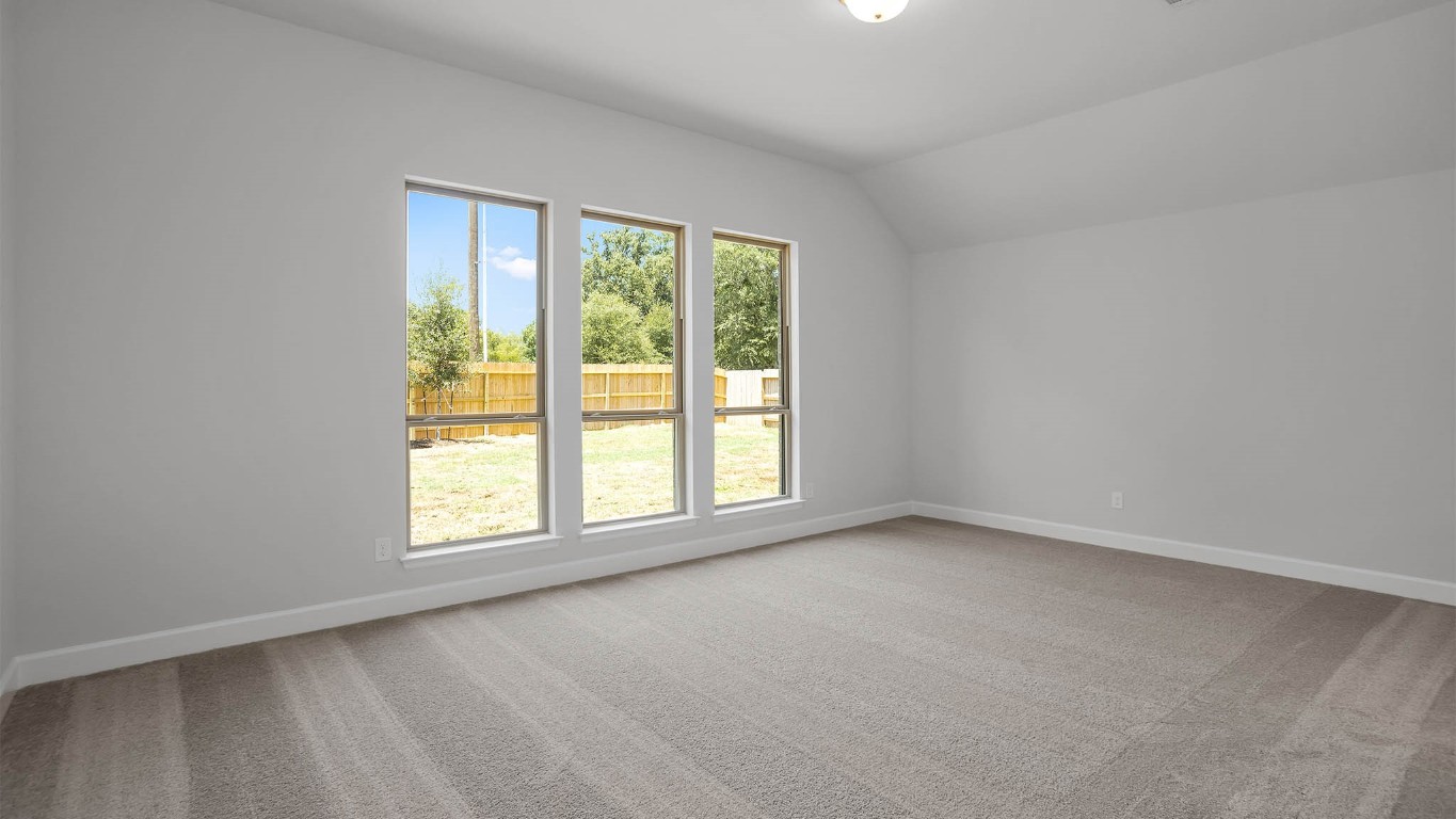 14952 Bright Berry Drive Conroe, TX 77302 - Photo 4 of 19 an empty room with a window