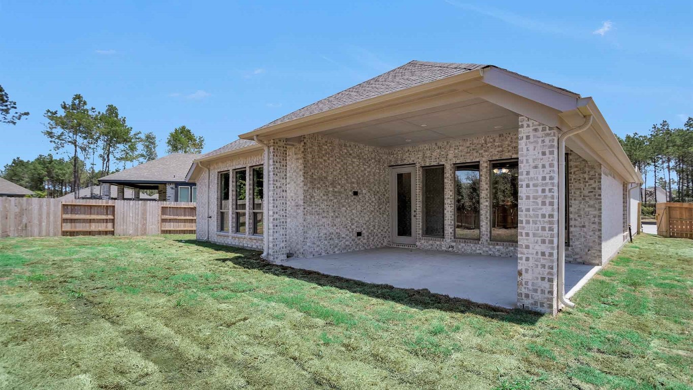 14952 Bright Berry Drive Conroe, TX 77302 - Photo 7 of 19 a view of house with yard and entertaining space
