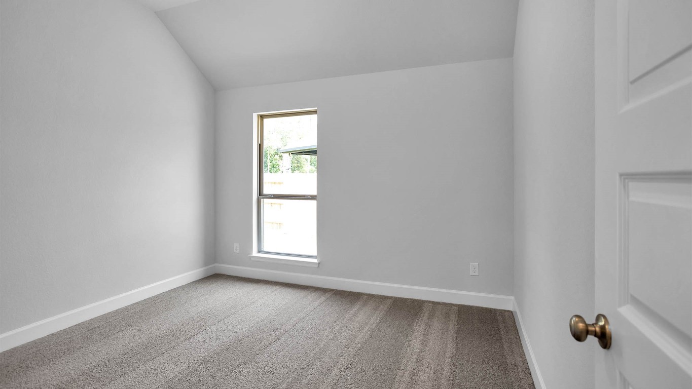 14952 Bright Berry Drive Conroe, TX 77302 - Photo 9 of 19 an empty room with a window