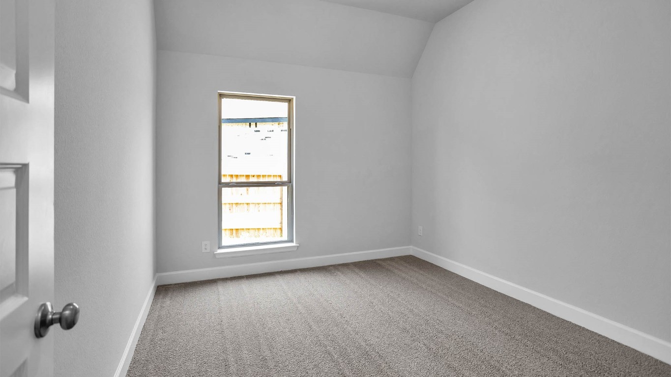 14952 Bright Berry Drive Conroe, TX 77302 - Photo 10 of 19 an empty room with a window