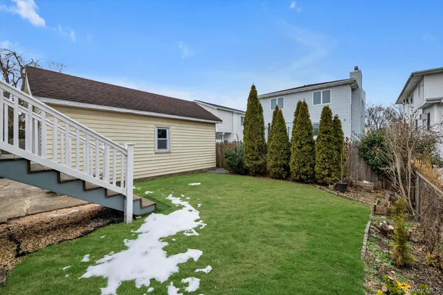 a front view of house with garden