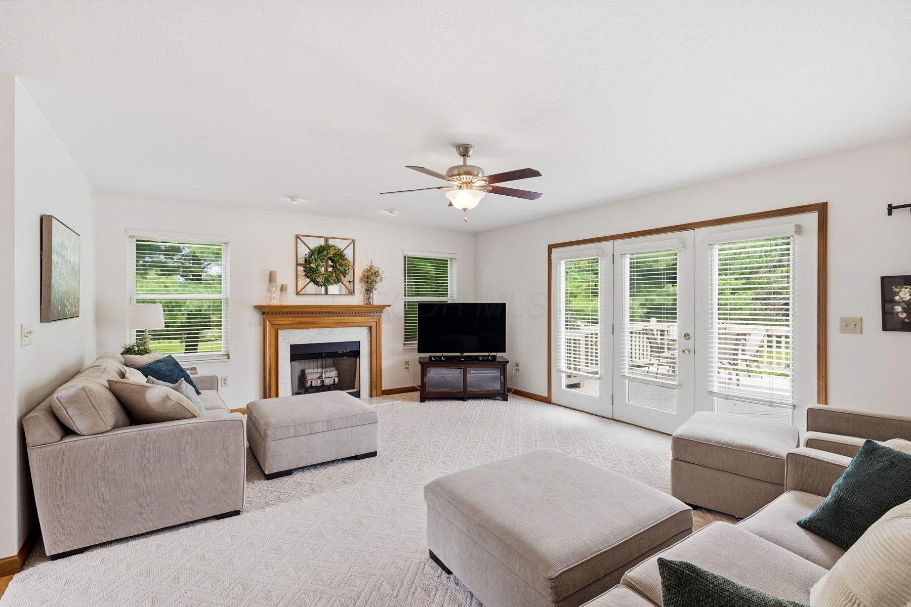 2248 Troy Road Delaware, OH 43015 - Photo 7 of 48 Large living room leading to the back deck
