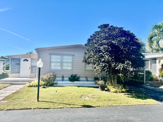a house view with a outdoor space