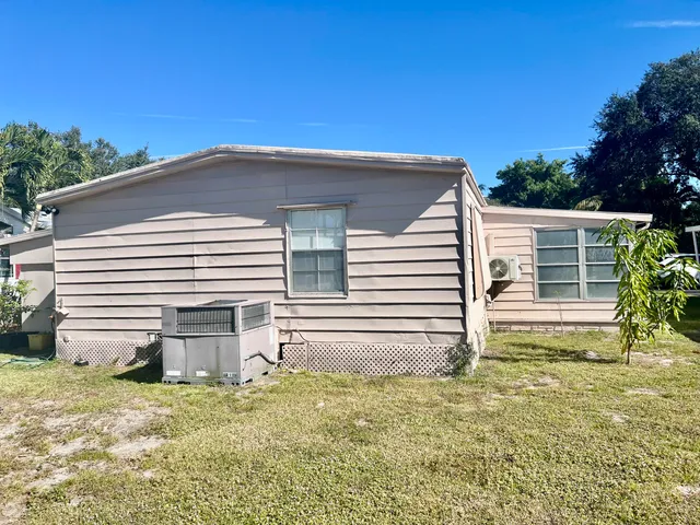 a house view with a garden space