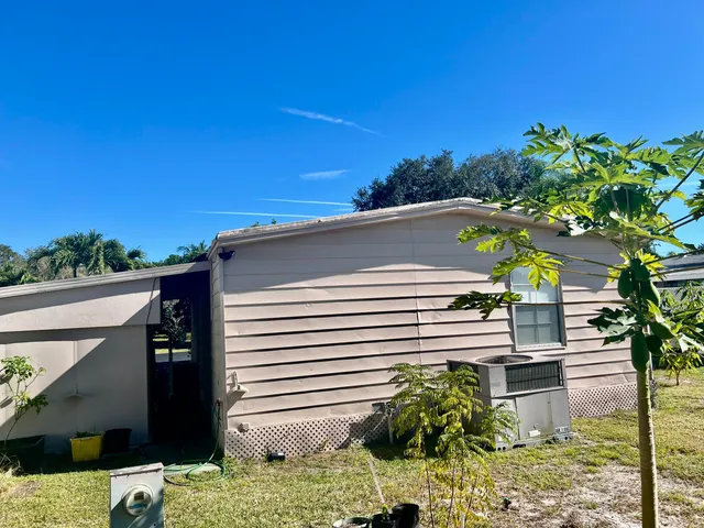 a view of a backyard with garden