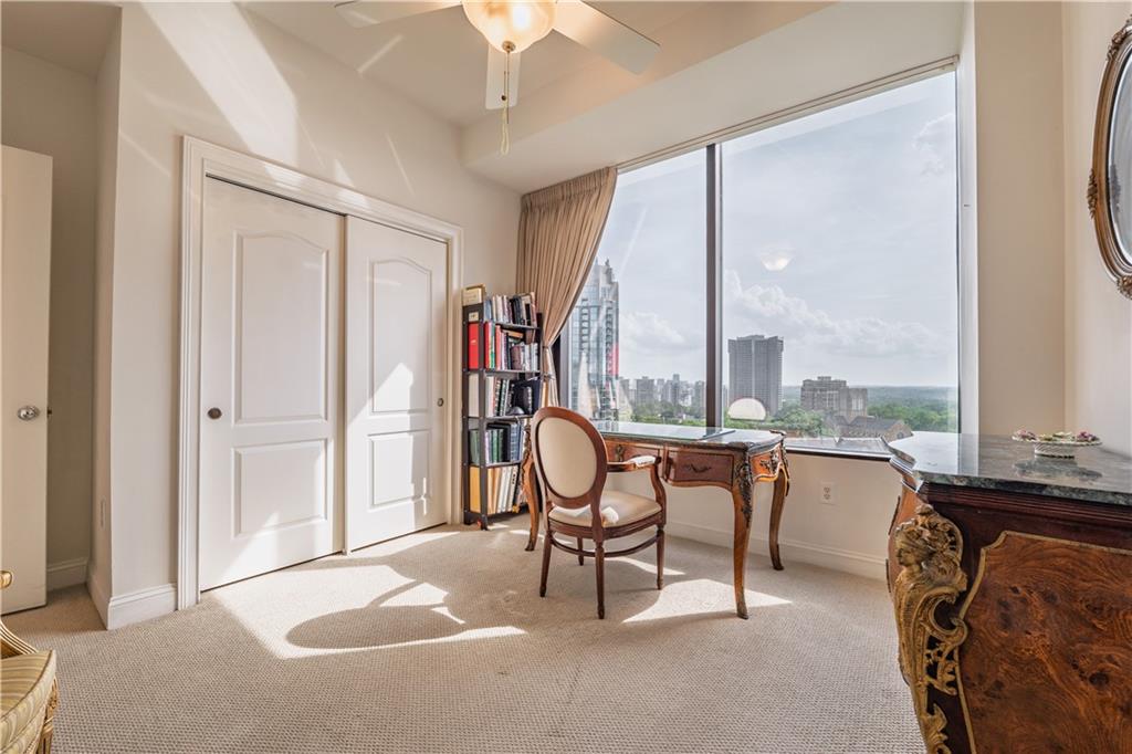2828 Peachtree Road Northwest, Unit 1501 Atlanta, GA 30305 - Photo 16 of 30 a view of a livingroom with furniture