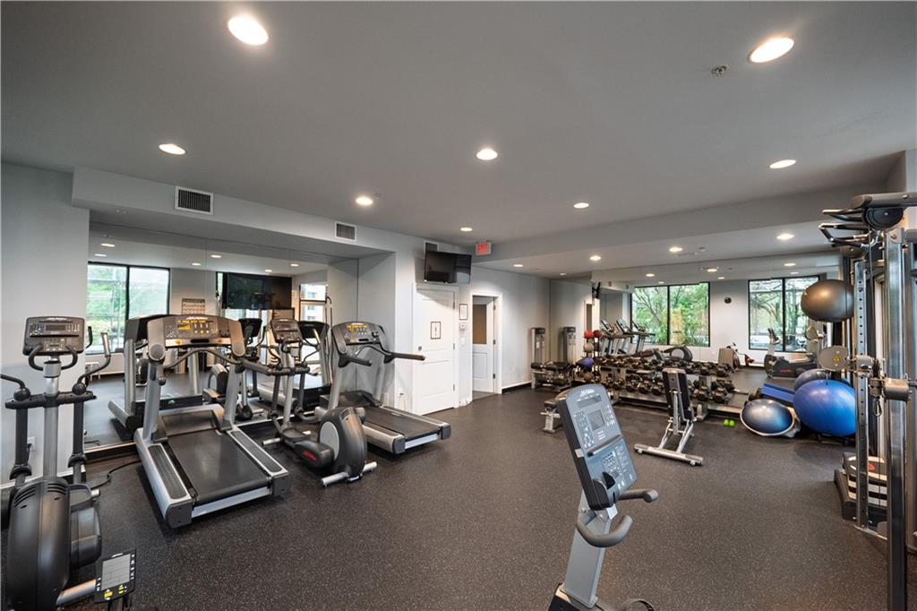 2828 Peachtree Road Northwest, Unit 1501 Atlanta, GA 30305 - Photo 23 of 30 a view of a room with gym equipment