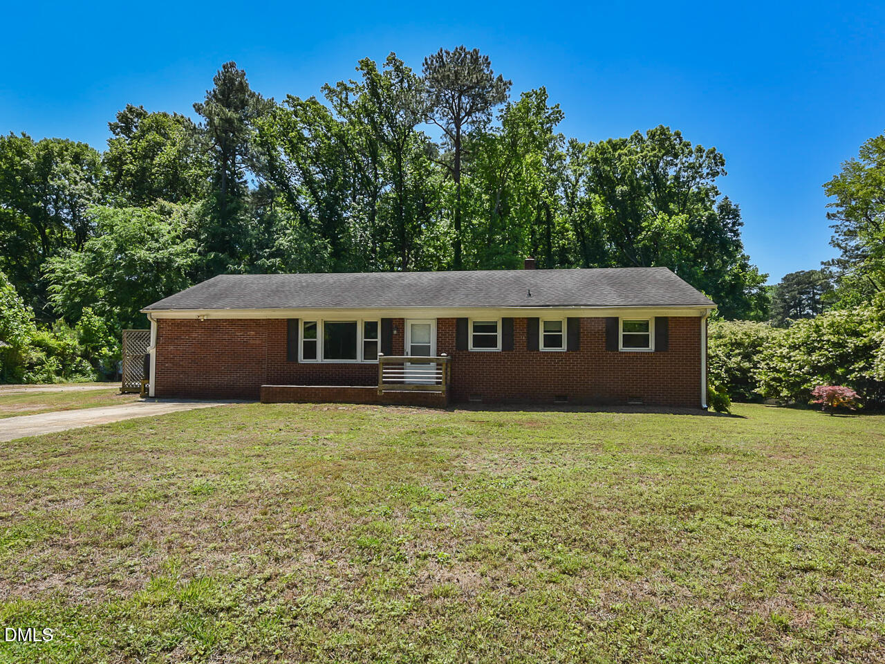 1703 St Patrick Drive Raleigh, NC 27603 - Photo 1 of 29 a front view of a house with yard