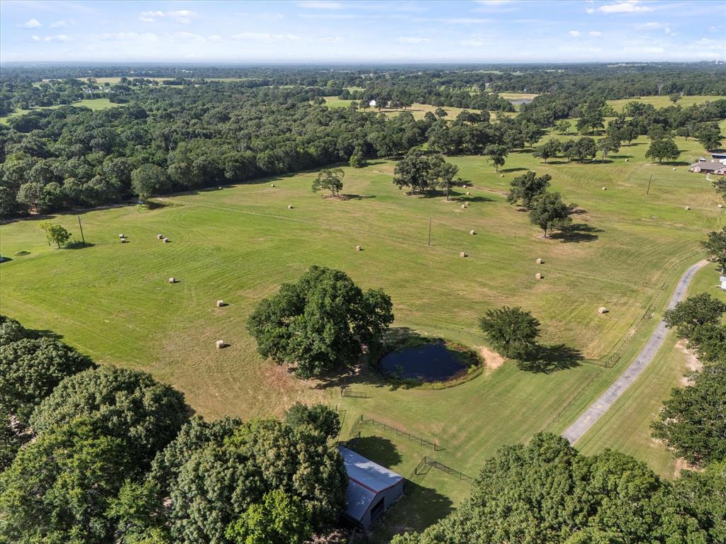 3104 County Road 3104 Edgewood, TX 75117 - Photo 11 of 24 a view of a lake with large trees