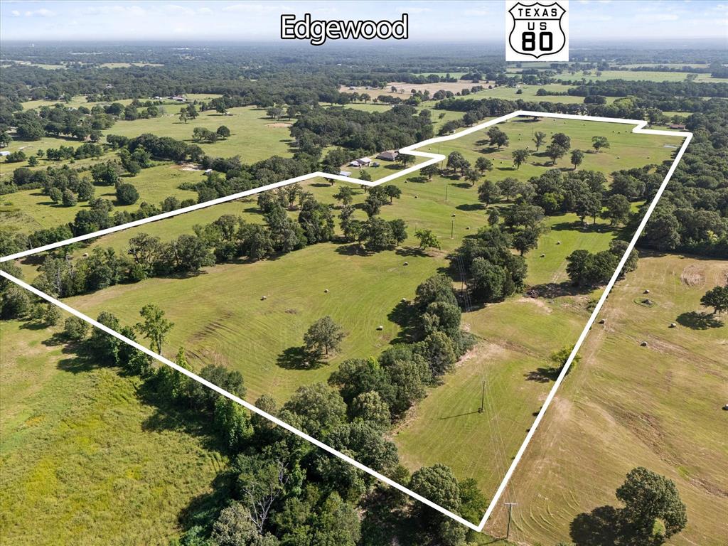 3104 County Road 3104 Edgewood, TX 75117 - Photo 23 of 24 a view of swimming pool with a balcony