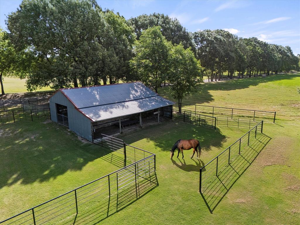 3104 County Road 3104 Edgewood, TX 75117 - Photo 4 of 24 a view of a terrace with sitting area