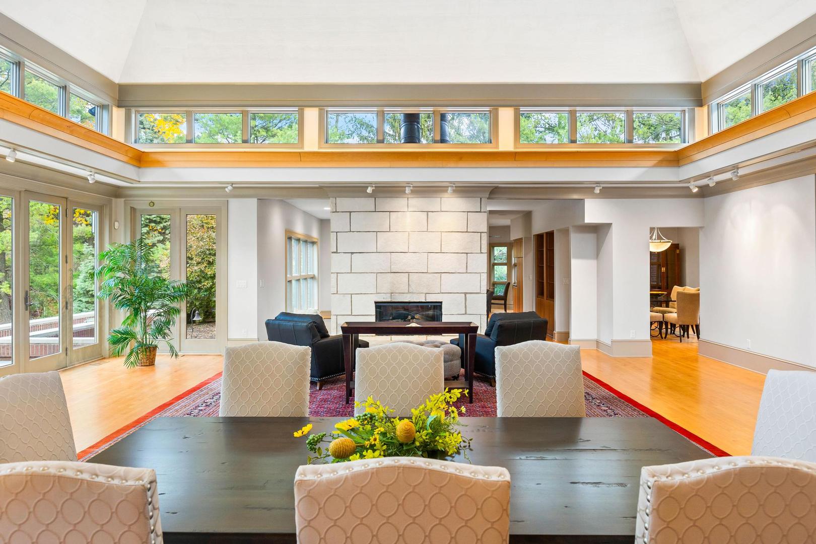 36 Sunset Road Bloomington, IL 61701 - Photo 14 of 67 a living room with fireplace furniture and a large window