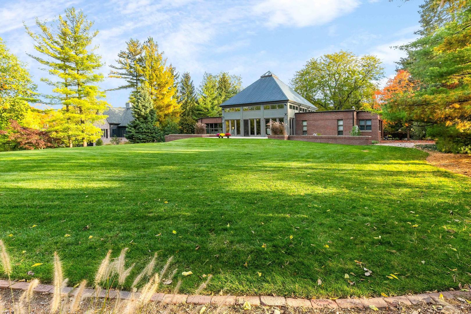 36 Sunset Road Bloomington, IL 61701 - Photo 34 of 67 a front view of a house with a garden