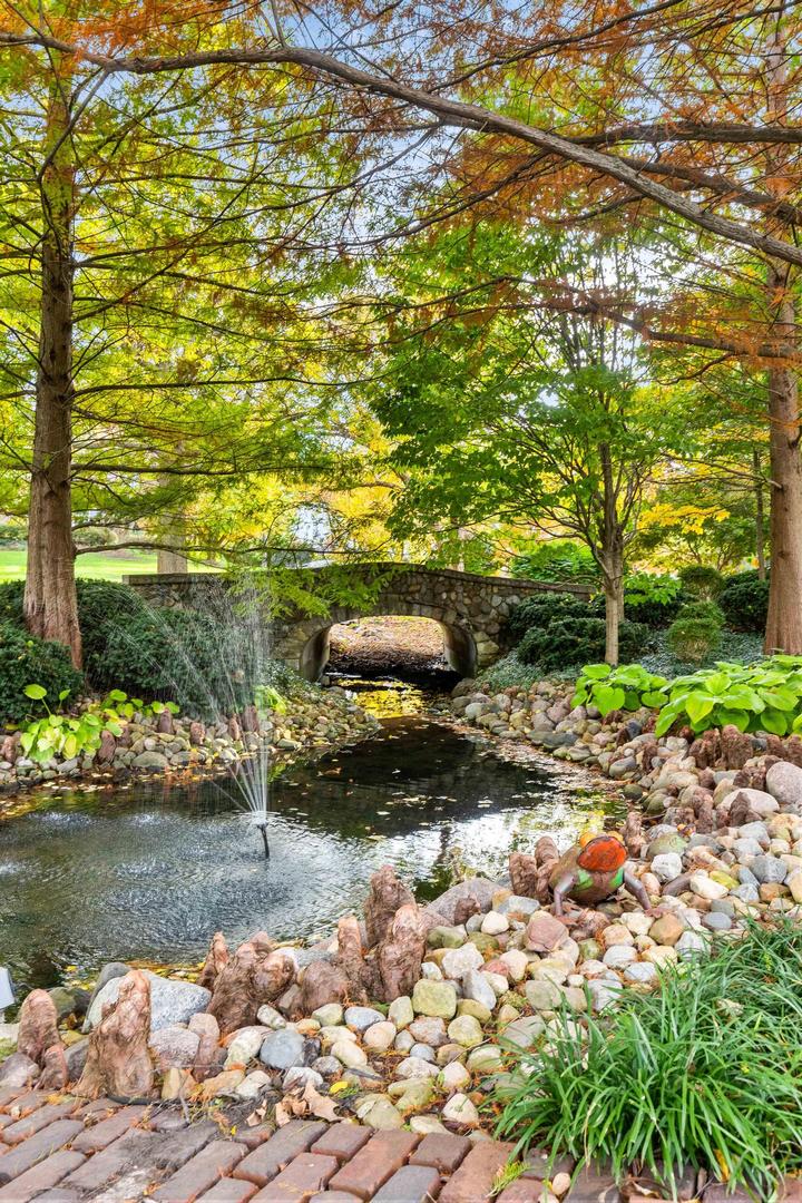 36 Sunset Road Bloomington, IL 61701 - Photo 66 of 67 a view of a lake with an outdoor space