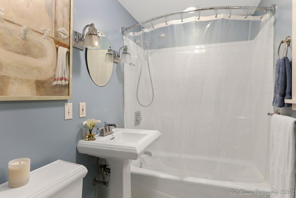 6 Pilgrim Road Hamilton, MA 01982 - Photo 11 of 32 a bathroom with a sink a toilet and shower