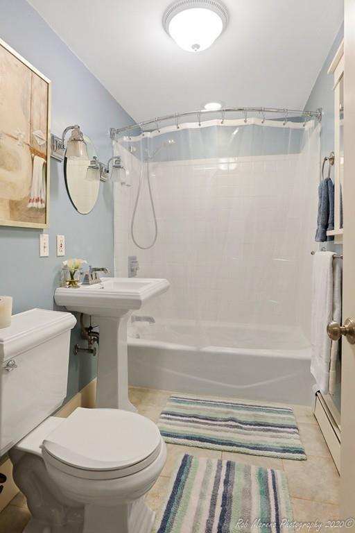 6 Pilgrim Road Hamilton, MA 01982 - Photo 12 of 32 a bathroom with a sink toilet and shower