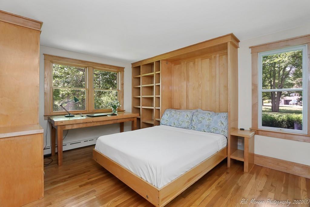 6 Pilgrim Road Hamilton, MA 01982 - Photo 15 of 32 a bedroom with a bed and a large window